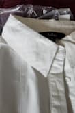 I received the brand-new shirt, but it had a red pen mark on the collar of the white shirt. :( There was no option to exchange. I am so disappointed because it is a great shirt, but I would love to have one that isn't ruined with red pen. - Kate B.