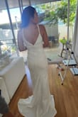 I love this dress. I have a similar formal dress like this in orange from lulus that I love. It's very fitted but very comfortable. I went with a more dramatic wedding dress from lulus, but if I was boujee and a baller like that, I would keep this dress and wear it to the reception. Definitely recommend. - RISS R.