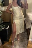 The dress is a lot more gold than the picture depicts and what I expected for an engagement picture dress. The straps were also extremely loose even on the tightest setting along with around the bust area - Meggan D.