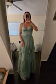 It's very pretty and actually has some shimmer in it, but this is not flattering for my small chest. - Allison B.