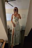 Gorgeous material. It's super lightweight and silky and love that the straps are adjustable. It is a little tight in the waist, and I'll probably get the leg slit altered but otherwise love. - Allison B.