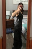 I had hoped this dress would be more form-fitting as shown on the model, but the fabric on the backside really does no favors for me. Unfortunately, I'll be returning this. Other than the fit, the dress is beautiful and light. I wouldn't have needed it hemmed had I decided to keep it. - Lindsay E.