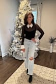 Fits well, comfortable. Throw on with jeans and look dressed up. Wore with black dress pants and heels to a work event and received a ton of compliments as well. A little loose at the armpits compared to the model photos - but I'm still happy with the purchase. - Sara