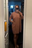 Like a dress! I'm 5, 5 and the dress is long at my knees level 
Very loos,e Nice with leggings - Tatiana B.