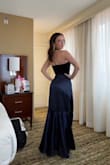 First off, this dress is stunning. I love the mixed materials. I got compliments all night at my work Gala. But the design has flaws, and like other reviews said, the straps are way too long and become awkward. The zipper also sucks. I ended up fully zipping it, and finagling the dress on over my head. The seam that runs down the back also gets very off-centered as you're walking around and you constantly have to adjust it. I feel like Lulus dresses are always SO close to being so good. 

I'm usually a pretty true Medium in dresses, but took a small and it fit like a glove. A medium would not have worked out for the top part. Overall I'd recommend, just know the design may not lay right. - Emily P.