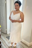 It is a beautiful simple dress that I wore for my court wedding. - Jenny B.