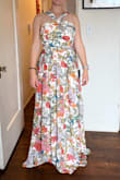 I'm 14 weeks pregnant and ordered a million dresses to find something that would be comfortable/ flattering/not invite too many questions about my changing shape. Normally, I am a 34C cup size and about 135lbs, and a small would have been perfect, but when I tried on the small, the waistband was quite snug and I had some problems with the zipper sticking. The medium was better in the waist, but the bodice was too large around my breasts. The straps were too long so it looked a little too blousy and wasn't flattering. As it's sold, I probably wouldn't have kept the medium, but I tailored the bodice quite a bit to straighten the neckline, added darts, shortened the straps to make it an empire waist, and also hemmed it. With the modifications I made, I love the dress and will be able to wear this dress to other formal events throughout pregnancy! The fabric is BEAUTIFUL and presses well. It was easy to get wrinkles out after traveling with it. I got many compliments on its summery vibe and colors! - Emma S.