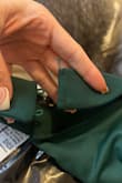 Love the dress but it arrived damaged. The zipper gets stuck and it is missing both buttons. - Valerie G.