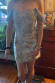 Obsessed with this dress. I've never seen anything like it. It's perfectly fitted and really incredible quality. There were no reviews when I ordered, so it was a gamble,e but I am in love - Eva R.