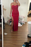 Scored on sale!! I was worried about not being able to wear a bra as my boobs are small but I can!! I'm wearing a VS light lined strapless and you it doesn't show in the back!!! Fabric is nice and has stretch. I'll have to hem as I'm petite. But dang, Lulus has the best party/formal dresses for real. - RISS R.