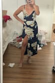 Score on sale! Dress has zero stretch. I love the adjustable straps!! I'm short so it's more of a maxi on me which still looks cute. I love it, so feminine! - RISS R.