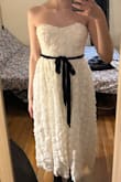 The dress is very cute and good quality. I got it on sale for commencement, so it was a steal. I ordered an XS even thought I'm usually a size S, and it did still fit a bit loose on the bust. I do have a small bust compared to my hip area, but a strapless pushup bra helped the issue. - Taina O.