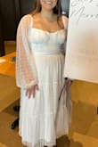 I wore this for my bridal shower and got some many compliments. The shower was in a colder state in March so having the long sleeves were great. Although not for warmth, just for a more winter look! I would definitely recommend this dress to others. The fit is great. - Brooke L.