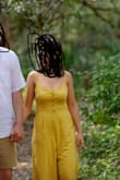 I love this jumpsuit. I'm short and I felt like the length was good. I wear it causally but also wore it for my engagement photos. - Aurora M.