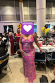 I am normally a size 16. The XXL fit perfectly and the dress has a little stretch. It was comfortable all evening. Sequins fell off throughout the night, but the dress is definitely wearable. - Ari W.