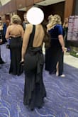 I got this dress for a formal event, and it came in with perfect timing. I'm 5'7 125 lbs and the XS fits me perfectly. The open back is so flattering, and the bow is adorable. I recommend this dress so much! - Emma R.