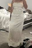 I am 5'2 and this dress was very long for me. I loved the material, but the straps were very thin and stretchy. I did return it. - Gresia L.