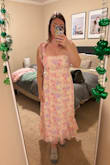 Normally would wear a medium but I sized up to a large as I'm pregnant. I think it's cute, super long on me, I'm 5'6". I will need to wear a bra under (34DD). - Morghan H.