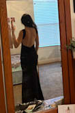 I think this dress is stunning. The open back is very classy, and I love the thick straps. It is the perfect material and I love how it hugs my body. I am wearing this dress my Senior prom and I cannot to take photos in it. I think I could have sized down, just because the straps were a little loose but that's also because I don't have a very big chest. This is the perfect classy backless dress for any formal event! - Katie F.