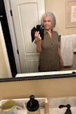 Heavy, opens at the top see bra, & uncomfortable, and no to a bigger size because the hips are big.  I received it today and immediately took picture to return. - Deborah G.