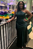 I ordered this along with 3 others in an attempt to find the best ball fit, this one stood out because I could still comfortably wear a bra and the slit was perfectly placed. It was classy and simple. The draping across the tummy area was also perfect. It was easy to iron at a hotel and dusted the floor at a perfect length. I paired it with black block heels and minimal jewelry. - Tomeka M.