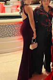 Super long! Had to hem but stunning & keeps you elevated but warm for a winter event. - Nicole D.