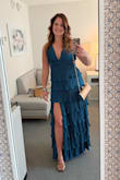 I bought this dress for a charity gala and it was so comfortable!!! It is a beautiful color, it doesn't wrinkle (which is good because I had to pack it in a suitcase), it had a built in bra and was a "flower" style below my waist so no shapewear required!

Highly recommend!! - Diane N.