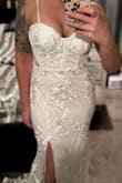 Got this beauty on sale for $88. I was skeptical until it arrived and I put it on. It's absolutely beautiful and worth every penny and more. I'm 5'7" 140 pounds and it hugs in all the right places. We are planning to elope and have a reception when we return. This is the dress I plan to wear at our reception. - Stephanie C.
