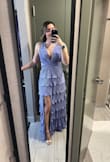 This dress hit the place when it came to the venue to the after party. Fits perfect, has the back that can be tightened so you feel more secured on the dance floor or just in general. Would highly recommend - Maria C.
