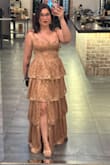 Wore this to my brother-in-law's wedding and received the most compliments I have ever gotten! I am very short. I did have the dress hemmed and the straps shortened so that it would support me better, and it was perfect after that. - Rachel A.