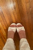 Got a size 10 because that was the only available size left closest to a 9 that is my size and they are comfortable. They don't feel like they will slide off and maybe that's due to my wide feet. - Joanne K.