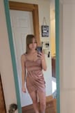 Love this dress, I know with a pair of nice heels it's going to look so good! It's not super stretchy but it does have a bit of give to it, I have on an xs - Clarissa T.