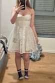 Very cute dress! I am going to wear it for the dance part in my wedding. The zipper is a hidden zipper so a bit hard to close (all zippers of this type are like this). Super recommend. - Tal B.
