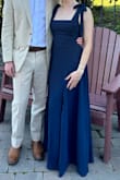 This dress is fantastic. Thick, expensive-feeling fabric, well structured, and looks beautiful. I wore this to a family member's wedding. I had it hemmed because I'm on the shorter side, but danced the night away and got so many compliments! - Emily M.