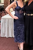 Elegant, subtly sexy, eye catching dress. Beautiful material - Tiffany K.