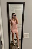 This was a perfect fit for me! It is very flexible. No too short and not too long. I love the back detail as well as the straps are so sweet! It did not bother me at all! I love every aspect of this dress! - Demet S.