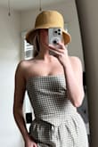 I'm always looking for the perfect vacation hat and this one fits the bill. You can adjust the size with the string on the inside and it gives excellent coverage. Can't wait to wear this on vacation! - Kassie G.