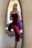 Absolutely love the color of this dress. I'm not too keen on wearing red because of my skin tone but I'm always on the hunt for a subtle red. The dress itself is like a burgundy base and then the flower is a gorgeous vibrant red. Taking this with me to Thailand! - Kassie G.