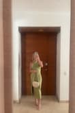 I wore this dress to my friends wedding in Cartagena, Colombia. It's a silky/satin material, and fits just like the model. I received so many compliments on the color and open back. Buy this dress!! - Jill F.