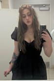 I bought this dress as a last ditched effort for a friend's wedding, I was very surprised by how flattering the shape of this dress is! The fabric is a bit fragile, think Halloween costume (this is not a negative, it added structure to the dress other fabrics could not) but this is why making sure you don't size down is crucial. If this material has too much tension on it I think it could run/rip. Especially in the corseted part of the dress, too much tightening and restriction could tear the lace holes. Overall, 9/10 for the price and how quickly it arrived! Side note for those with larger breasts, it does not have any boning or support in the bodice, so I did end up wearing a supportive bra. - Sophia H.