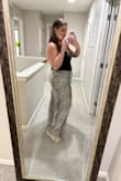These fit so well, actually a tiny bit big for me (size 14 jean) which is fine! I wore them all night and they're very roomy and stylish. I love them! - Katie R.