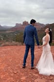 The dress was absolutely perfect. It is designed with a lot of details which make it perfect. I had to adjust the length a bit but that was all. I had a pre-ceremony photoshoot and the dress did not look dirty because it has a beige fabric underneath. - Eliana E.
