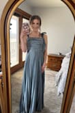 Really loved the look of this dress and got so many compliments on it. However, I did have to get it altered quite bit. I'm very short so I expected to have to get length taken off. I also needed the straps taken in. I had the bow size reduced bc it was so big and funky. Really cute after the alterations. I was comfortable in it for several hours. I'm typically a size small in lulus, and was in this dress as well. - Brya S.