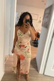 Not too much stretch. A little tight in the boob area but doesn't squish them. Soft and light. - Clarissa R.