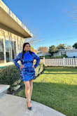 The material is really good and definitely more than what I expected for this type of dress. It is a little loose in the back area and you can see some open curves. Wish the fit in the back area was a little adjustable. - Dhara N.