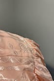 The quality was not great. Threads were hanging off every seam. It looked shiny. Was not for me. - Alarna G.