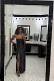The dress was beautiful, but the corset top lacked boning, which caused it to keep slipping down. I had to wear a strapless bra and use safety pins to secure the top to it, preventing it from sliding off. Aside from that, the dress was lovely. - Crystal W.