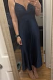 This dress is stunning! I wore it for a wedding and got multiple compliments. Did not need to wear a bra. It was a little snug in the ribs, not horrible. The zipper did seem a little cheap. Overall, I would recommend this dress! - Kerry E.