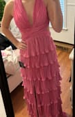 This dress fits perfectly! The top has lots of support and makes you feel secure. Dress is pretty long, which for me is a good length, when I put heels on. Overall, great fit and beautiful dress! - Athens B.