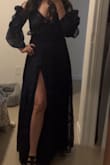 This dress is beautiful and so comfortable. The fit was great and the length was just right. I love the sleeves and cannot wait to wear it again. - Ana V.